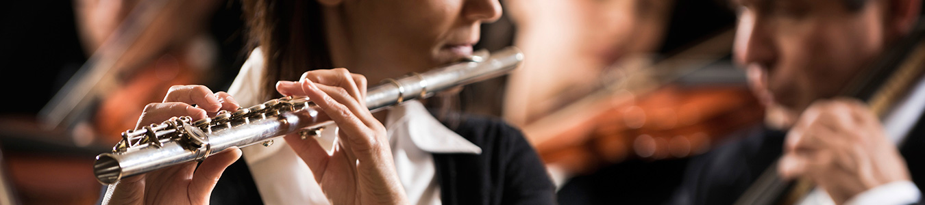 Flute player in an orchestra